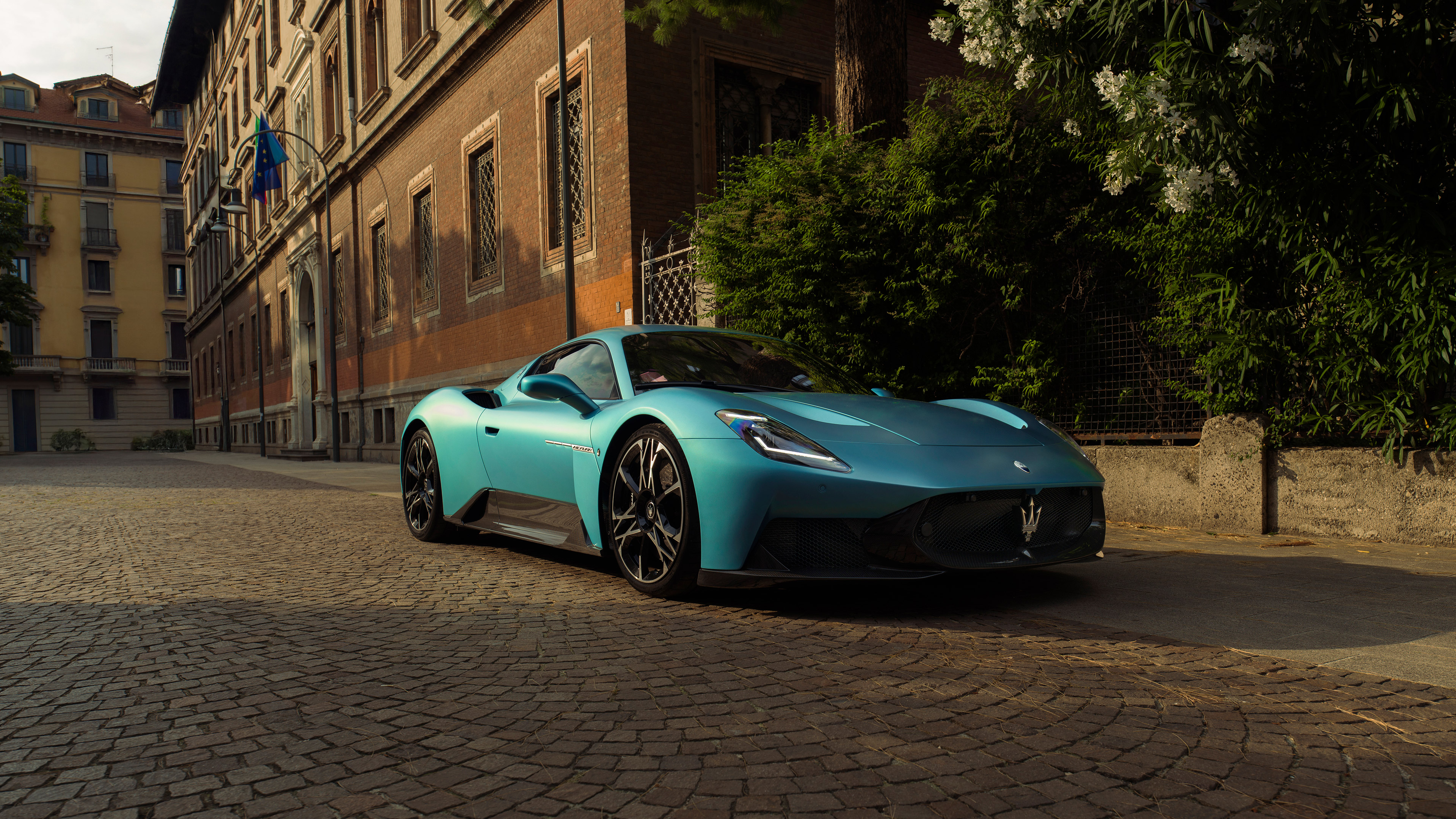 Maserati MCPura front three-quarter view on a Milanese street
